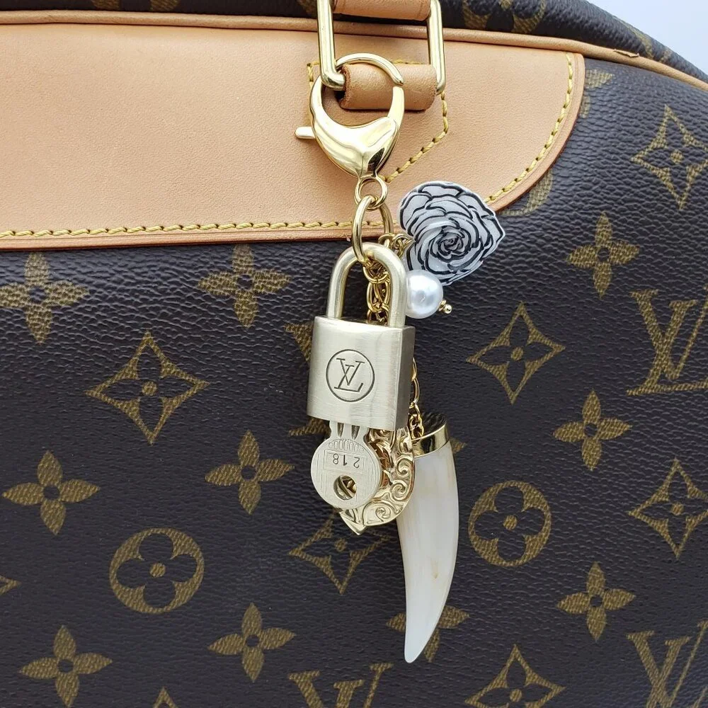 Authentic Louis Vuitton Padlock w/Unbranded Resin Horn Stainless Steel Keycharm